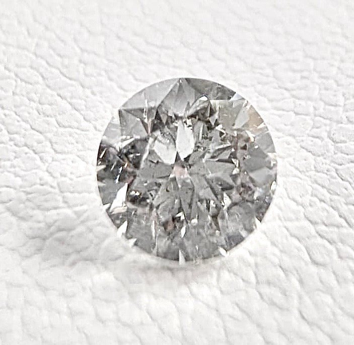 0.48ctw H-I SI2 Round Mined Diamond