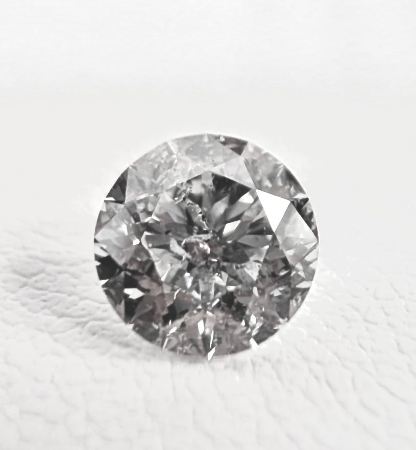 0.74ctw H I1 Round Mined Diamond