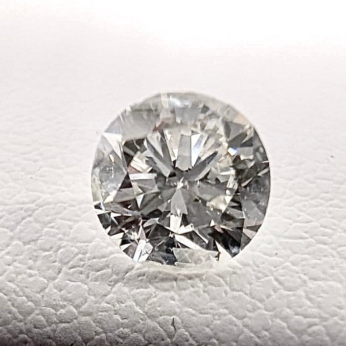 0.56ctw I-J I2 Round Mined Diamond