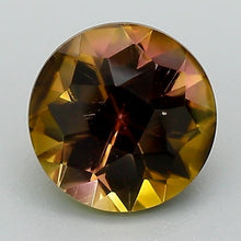 Load and play video in Gallery viewer, 1.31ct Orange-Brown Round Tourmaline (Zambia)
