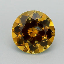 Load and play video in Gallery viewer, 0.95ct Orange Round Brilliant Montana Sapphire

