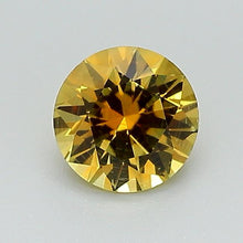 Load and play video in Gallery viewer, 0.81ct Orange Round Brilliant Montana Sapphire
