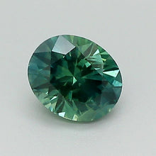 Load and play video in Gallery viewer, 0.85ct Greenish Blue Oval Brilliant Montana Sapphire
