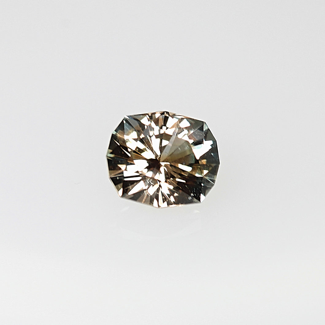 0.94ct Bi-Color Green-Brown Cushion Sapphire