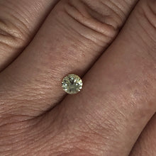 Load image into Gallery viewer, 0.64ct Light Yellow-Green Round Sapphire
