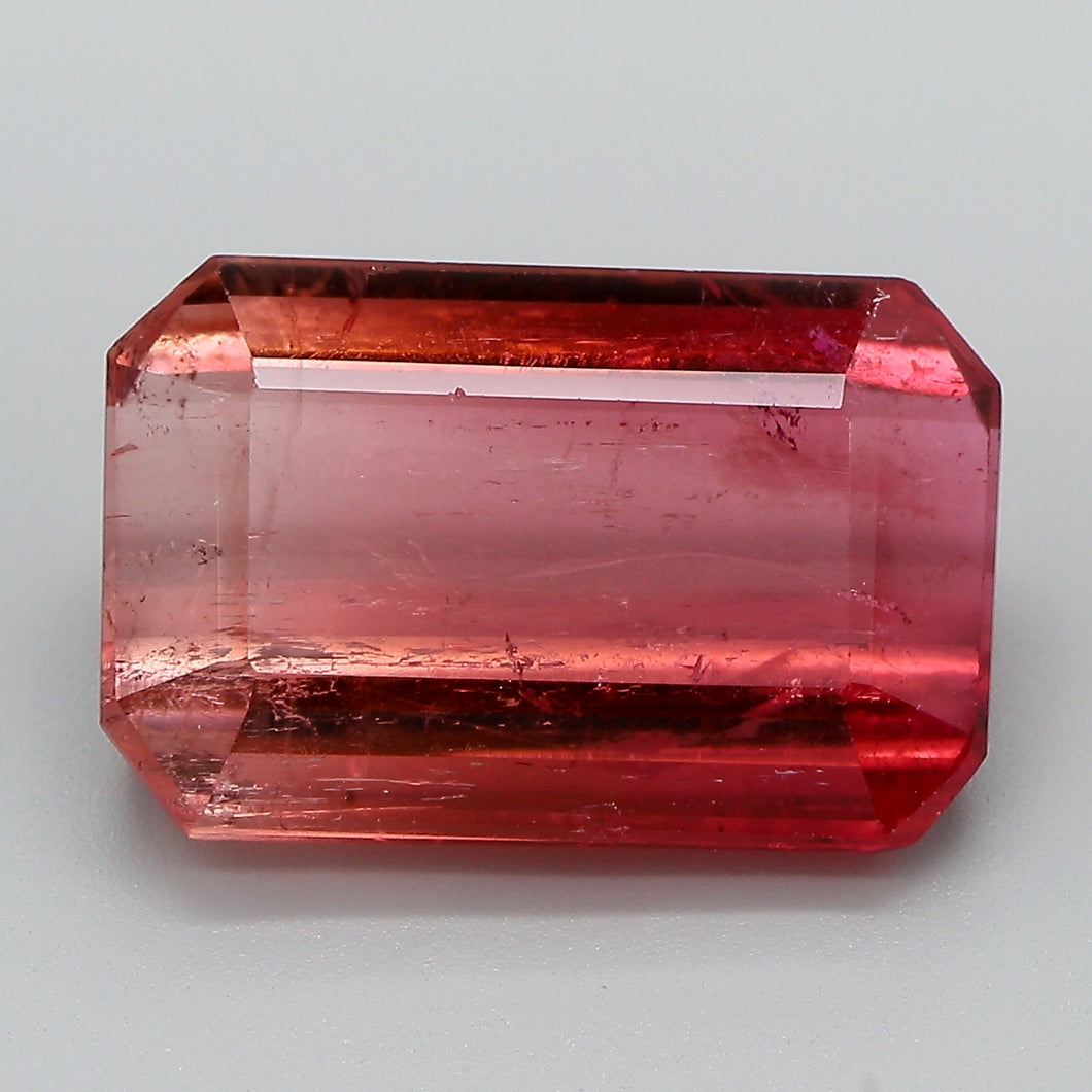 7.31ct Orange and Pink Emerald Cut Pink Brazil Tourmaline, IGI Certified